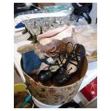 Antique baby clothes and shoes  in an antique