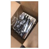 Box of silverware kitchen utensils