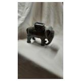 Cast iron miniature elephant coin bank. 3" tall
