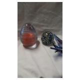 2 paperweights and a blown glass butterfly.
