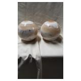 Set of two marble paperweights. 4" tall.