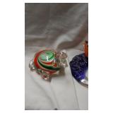 Turtle ?? paperweight. And glass fish votive