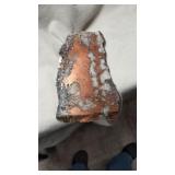 Flat rock with copper and looks to be granite. 5"