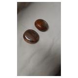Two polished stones.