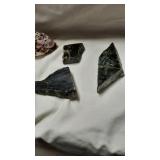 Laboradorite rough rock chips. And a mule carved