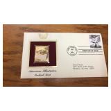 First day issue Rockwell Kent gold stamp.