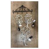4 pc wall decor. 3 light up flowers plus metal
