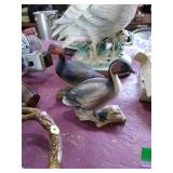 Pair of ceramic duck figurines.
