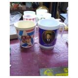 Vintage cups x2.  One of them has a picture of