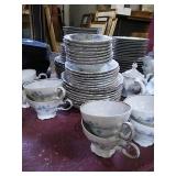 Beautiful china set for 8, with 2 covered dishes.