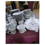 Gorgeous china set with serving dishes.