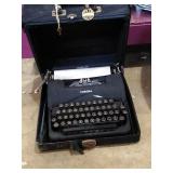 Vintage Corona typewriter in case.