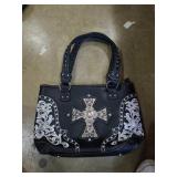Black leather purse with cross. In great