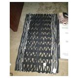 Floor mat made out of tires. 28in x 16in