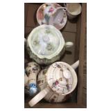 Tea pot, egg goblet, utensils for serving and