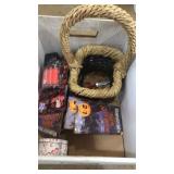 Books, night light basket and lantern candle