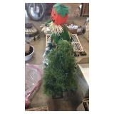 Mini Christmas trees scare crow