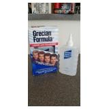 2 big bottles of GRECIAN FORMULA. 
GRADUALLY