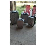 Brand new 4 piece luggage set with handles and