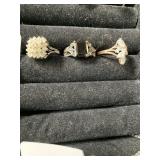 Three rings 1 marked 925 and two marked 18 karat