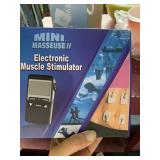 Electronic muscle stimulator mini masseuse new in
