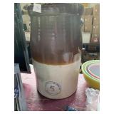 Tall crock by Annapolis stone where company