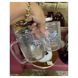 To Tervis mugs one with a manatee in the other