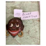 Black americana Mechanical Brooch Marked made in