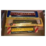 Flat of 3 train cars with boxes