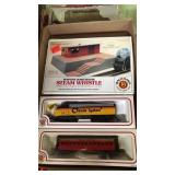 Flat of 2 train engines and a warehouse