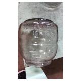 Glass water cooler bottle marked Patented July