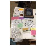 Large lot of assorted collectible coins and books.