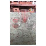 3 measuring cups. Pyrex 4 cups, Pyrex 1 cup,