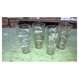 4 vintage drinking glasses with guns and coaches