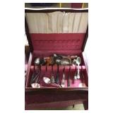 Assorted flatware in box. Some silverplate.