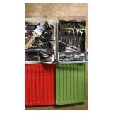 2 containers with lids of assorted flatware.