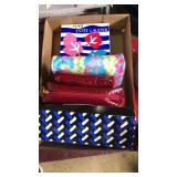 Flat of Estée Lauder cosmetics bags with makeup