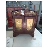 Vintage decorative jewelery box . About 10in.