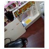 Singer Genie sewing machine with foot pedal note