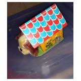 Wind-up vintage dog in metal Dog House works