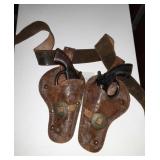 Pair of toy Metal Guns in holster with belt no