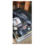Box of dvds and DVD player