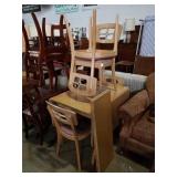 Table. 4 chairs. Fold out. 2 leaves. Nice.