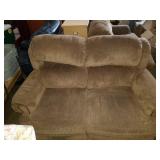 Very nice love seat sofa. Recliner. 62x38x36.