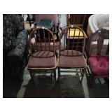 2 wooden chairs.