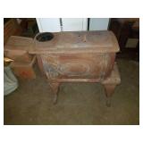 Vintage stove. 27x12x23.