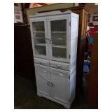 White cupboard. 31x66x13.