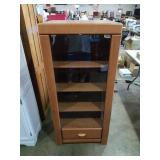 Shelving unit. Glass door. 4 shelves. 25x55x21.