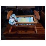 Baby crib swinging. 23x13.