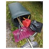 Rubbermaid garbage can with snow shovels and more